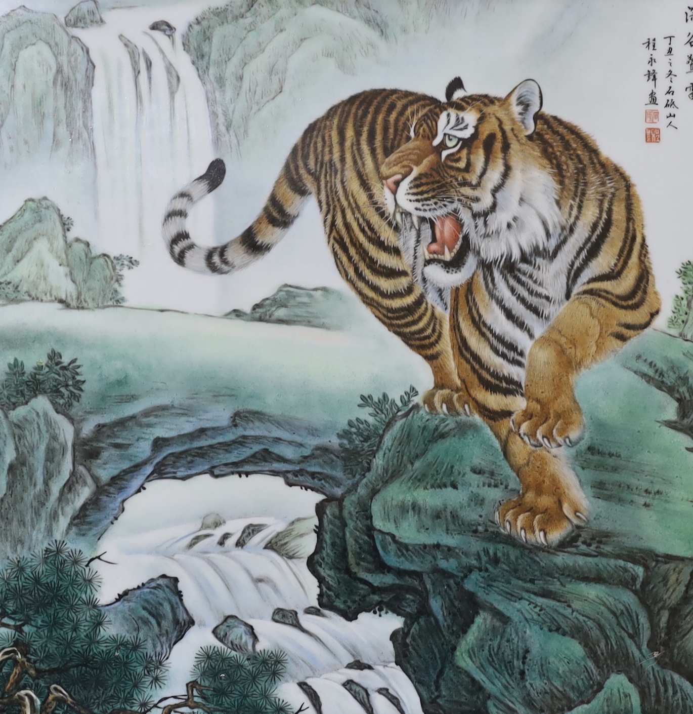 Two Chinese framed enamelled porcelain plaques, one of a tiger and another of two girls, largest 32cm wide x55cm high